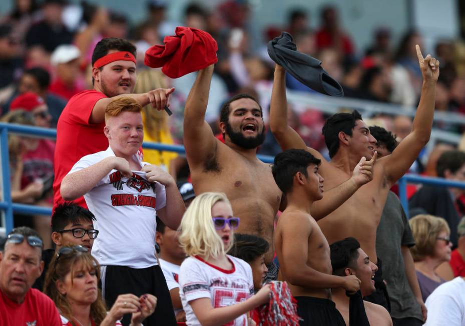 UNLV fans cheer during a football game against Wyoming at Sam Boyd Stadium in Las Vegas on Satu ...