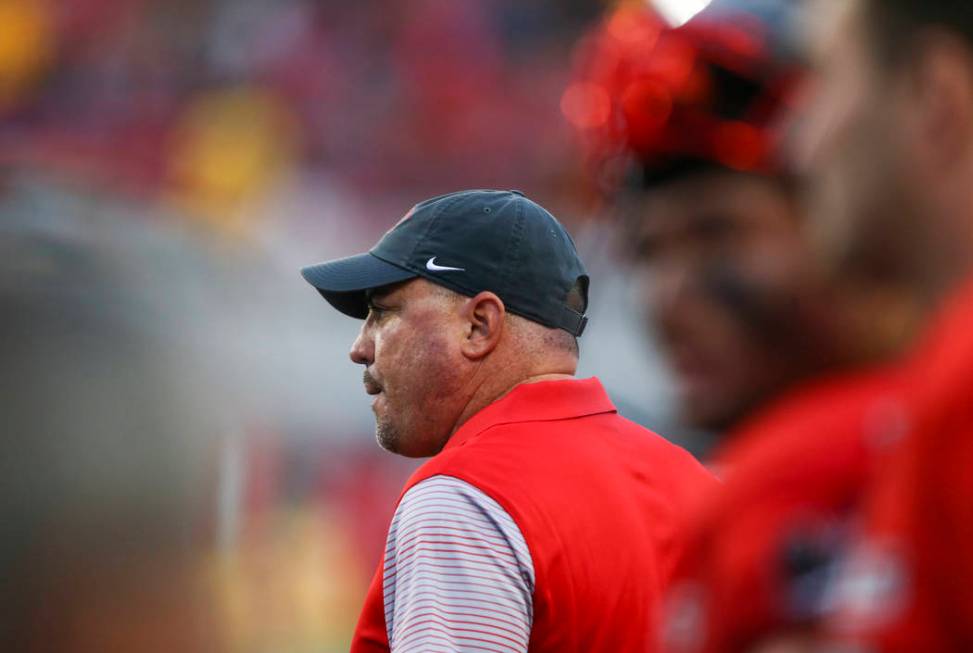 UNLV head coach Tony Sanchez looks on during a football game against Wyoming at Sam Boyd Stadiu ...