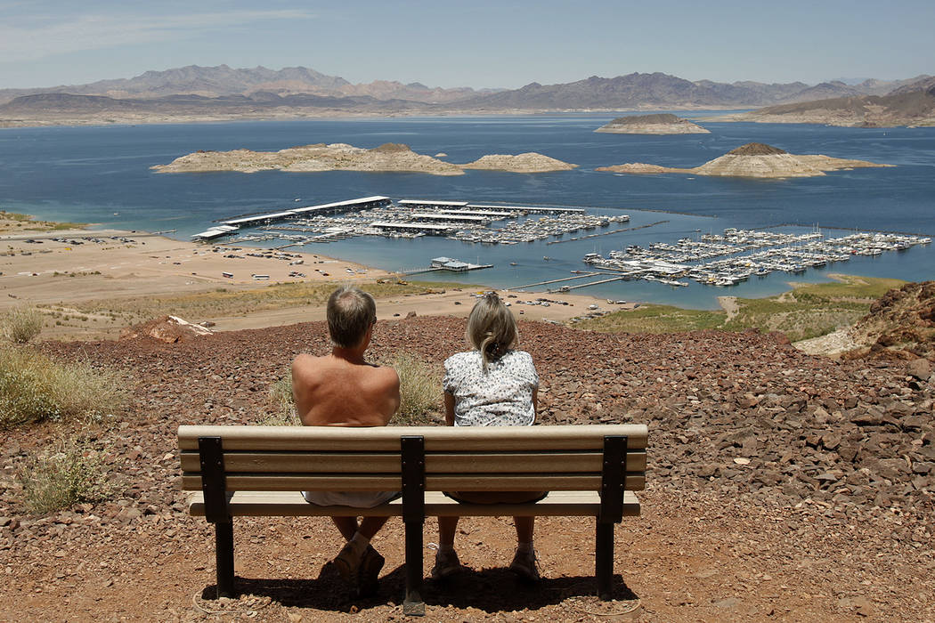A couple takes a break along the Historic Railroad Trail overlooking Lake Mead. (Las Vegas Revi ...