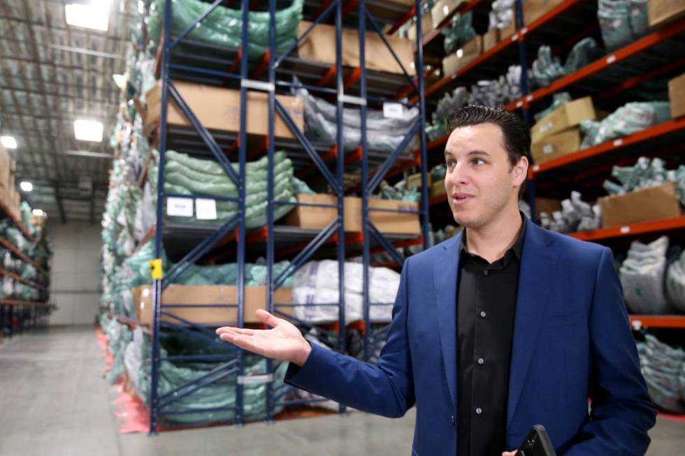 Chief Operating Officer David Meniane gives a tour of the new CarParts.com distribution facilit ...