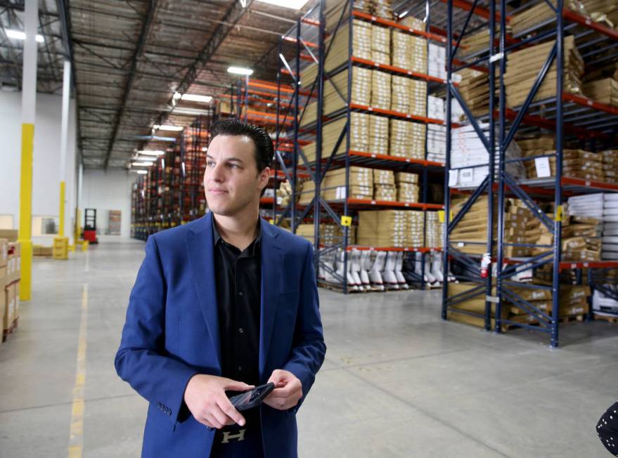 Chief Operating Officer David Meniane gives a tour of the new CarParts.com distribution facilit ...