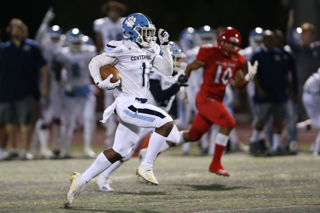 Centennial's Jordan Smith (1) runs the ball for a touchdown against Arbor View during the first ...