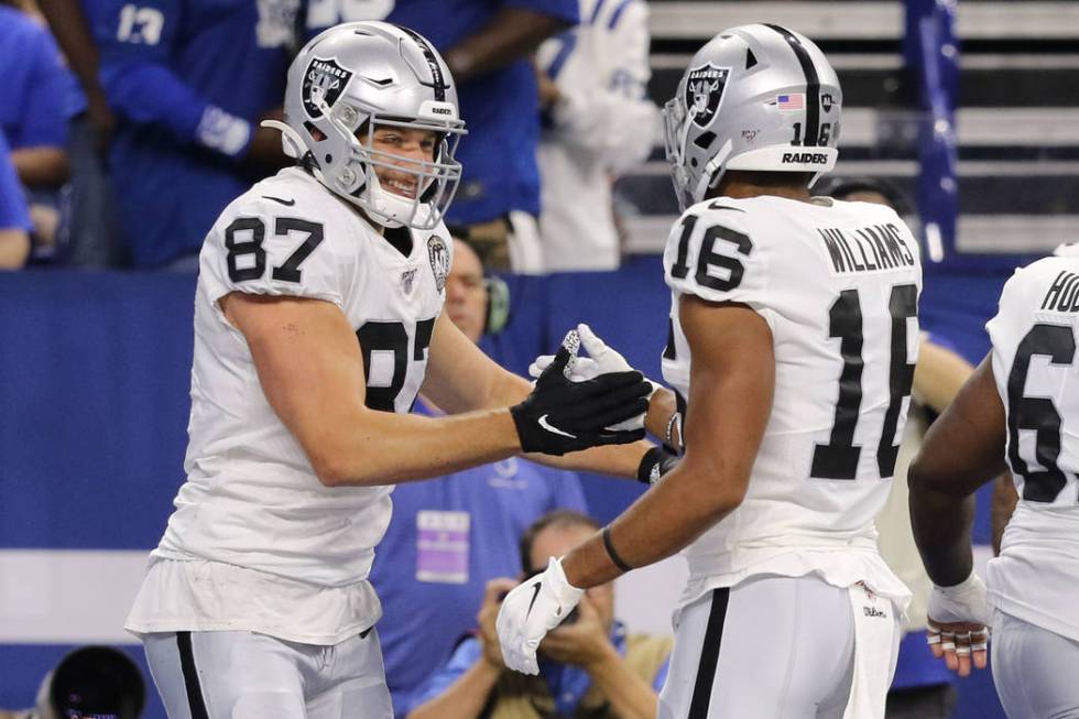 Oakland Raiders tight end Foster Moreau (87) celebrates his touchdown with wide receiver Tyrell ...