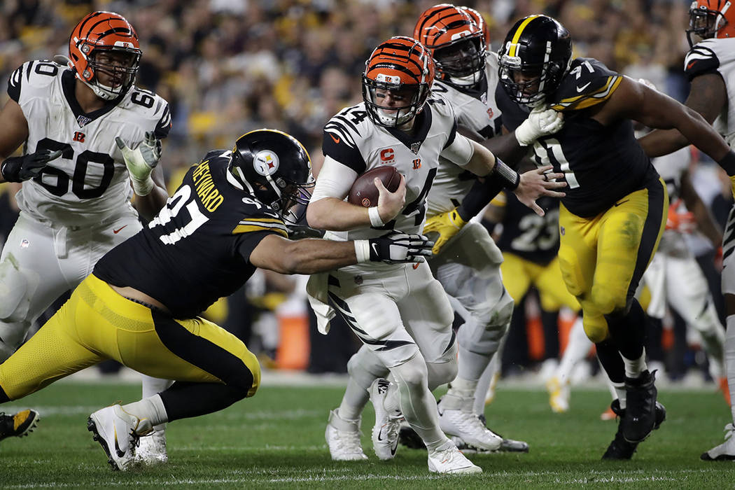 Pittsburgh Steelers defensive end Cameron Heyward (97) sacks Cincinnati Bengals quarterback And ...