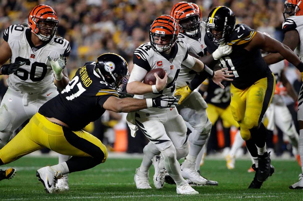 Pittsburgh Steelers defensive end Cameron Heyward (97) sacks Cincinnati Bengals quarterback And ...