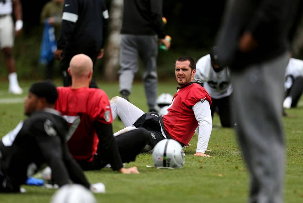 Oakland Raiders quarterback Derek Carr attends a training session during the media day at The G ...