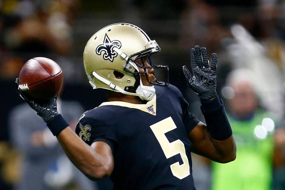 New Orleans Saints quarterback Teddy Bridgewater (5) throws in the first half of an NFL footbal ...