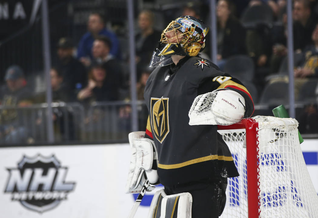 Golden Knights goaltender Marc-Andre Fleury (29) reacts after giving up a goal to the Arizona C ...