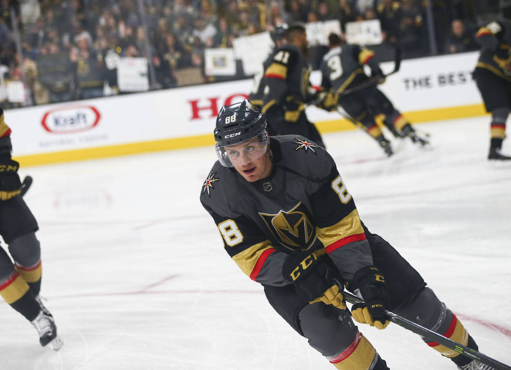 Golden Knights defenseman Nate Schmidt (88) skates on the ice during warmups before the start o ...