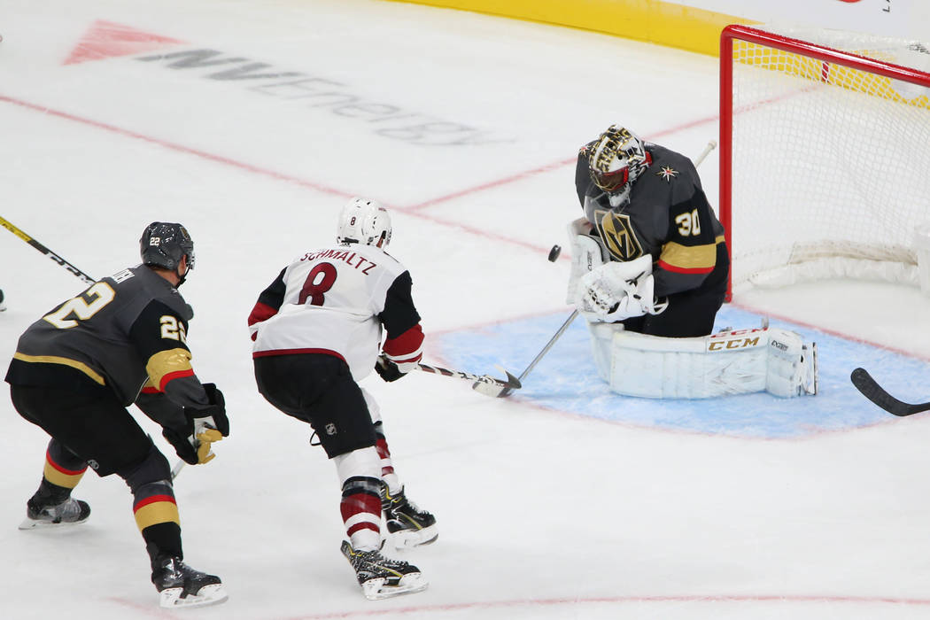 Vegas Golden Knights goaltender Malcolm Subban (30) defends a shot from Arizona Coyotes right w ...
