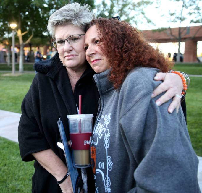 Michelle Eisenberg of Chino Hills, Calif., right, gets a hug from her "Earth angel," Heidi Dupi ...