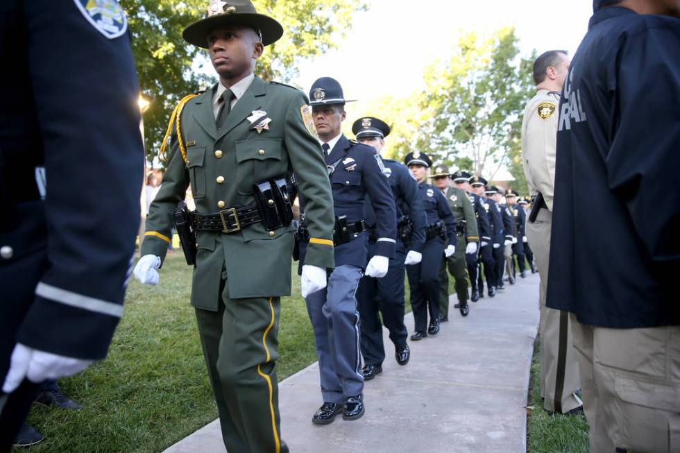 Members of the honor guard at the Clark County Government Center in Las Vegas on Tuesday, Oct. ...