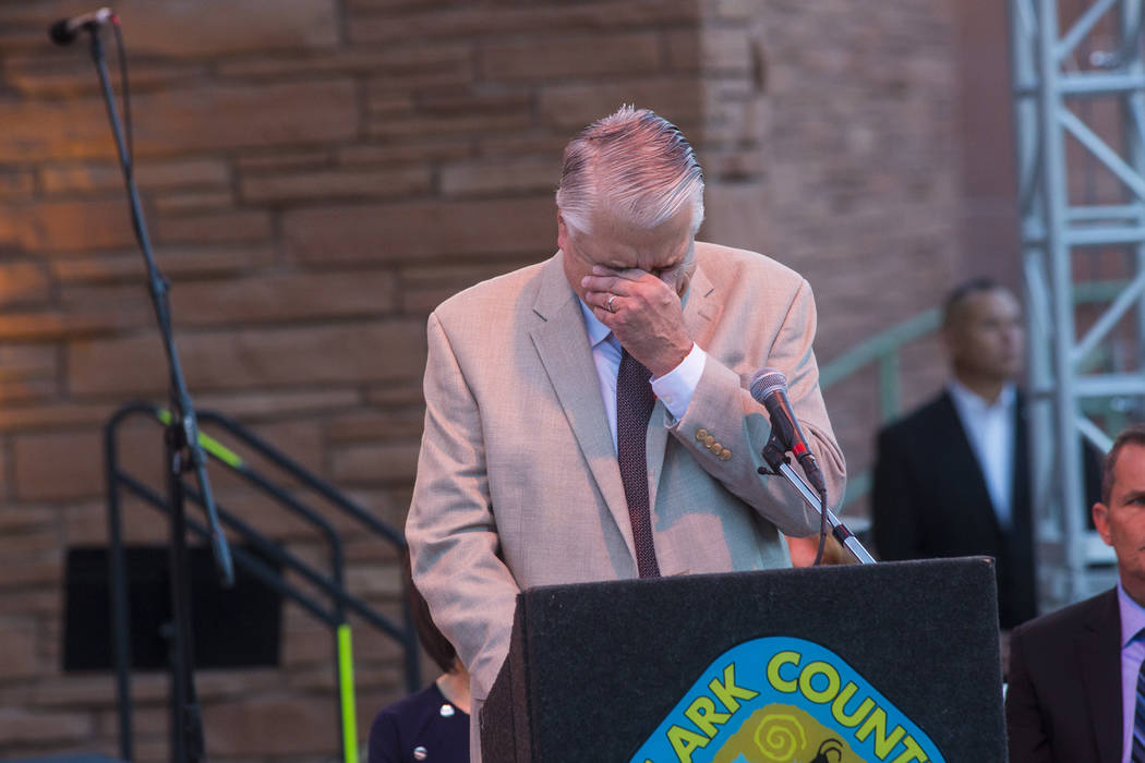 Gov. Steve Sisolak reacts while speaking during a sunrise ceremony in remembrance of the 58 vic ...