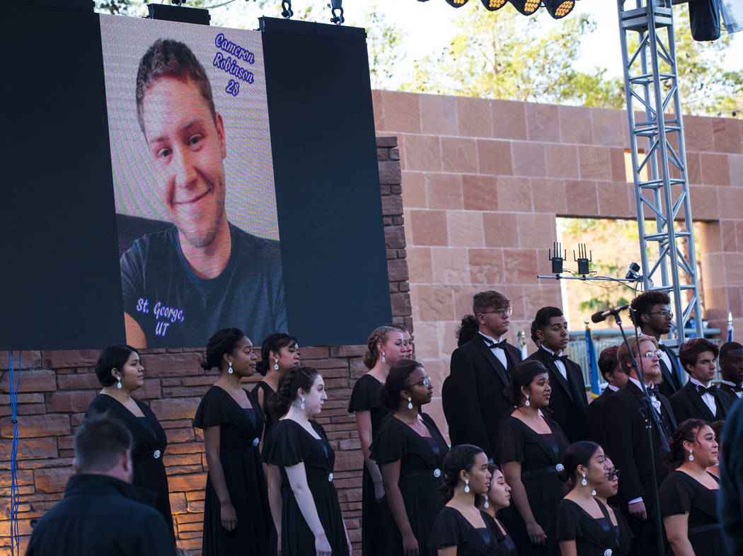 A photo of Route 91 Harvest festival victim Cameron Robinson is displayed during a sunrise cere ...