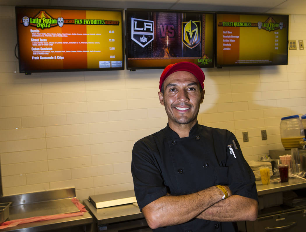 Latin Fusion Grill owner and chef Ernesto Saavedra poses for a portrait before the start of a G ...