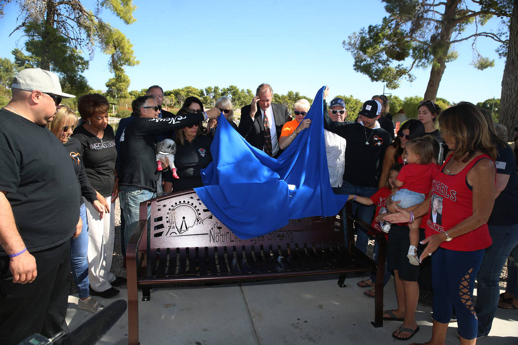 Attendees unveiled a bench in tribute to the 58 victims of the Route 91 Harvest festival during ...
