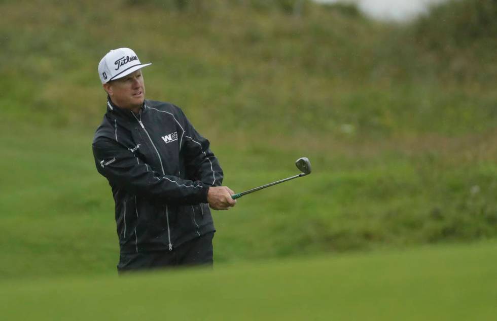 Charley Hoffman of the United States plays onto the 15th green during a practice round ahead of ...