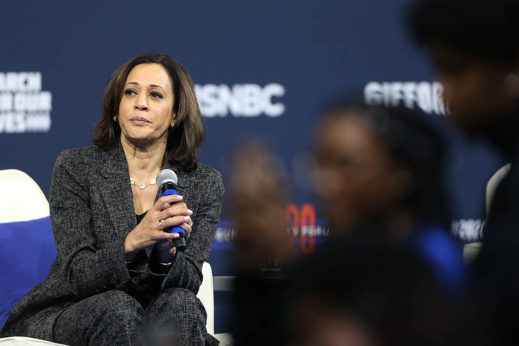 Democratic presidential candidate Kamala Harris takes a equation from the audience during the 2 ...