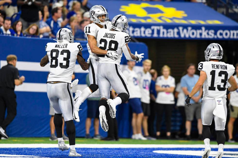 Oakland Raiders wide receiver Trevor Davis (11) celebrates a touchdown running back Josh Jacobs ...