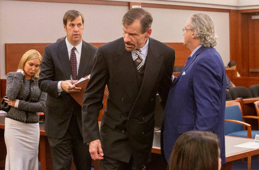 Ashley Fargo, defense attorney David Brown, Henry Nicholas III and defense attorney David Chesn ...