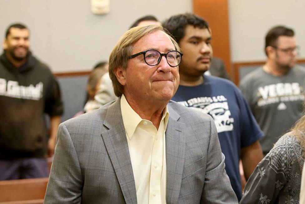 Retired Las Vegas Convention and Visitors Authority CEO Rossi Ralenkotter, left, stands as the ...