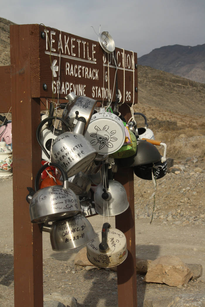 Many visitors bring hand-decorated tea kettles to leave at Teakettle Junction along Racetrack R ...