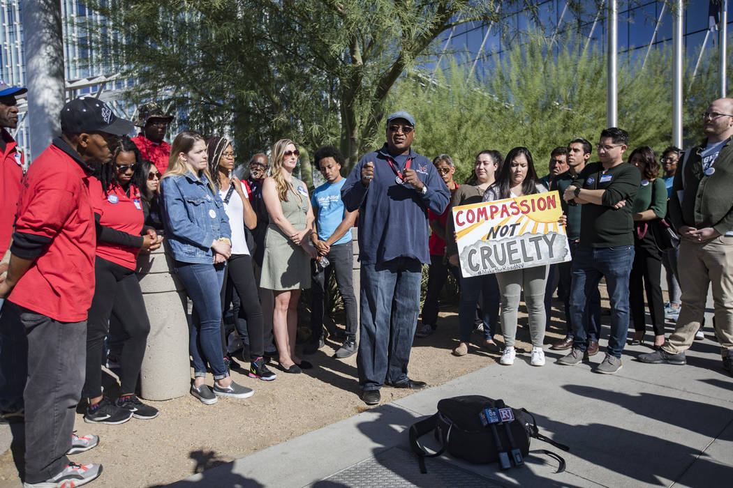 Thomas Randle-EL, co-founder and director of Straight From the Streets, addresses the media at ...