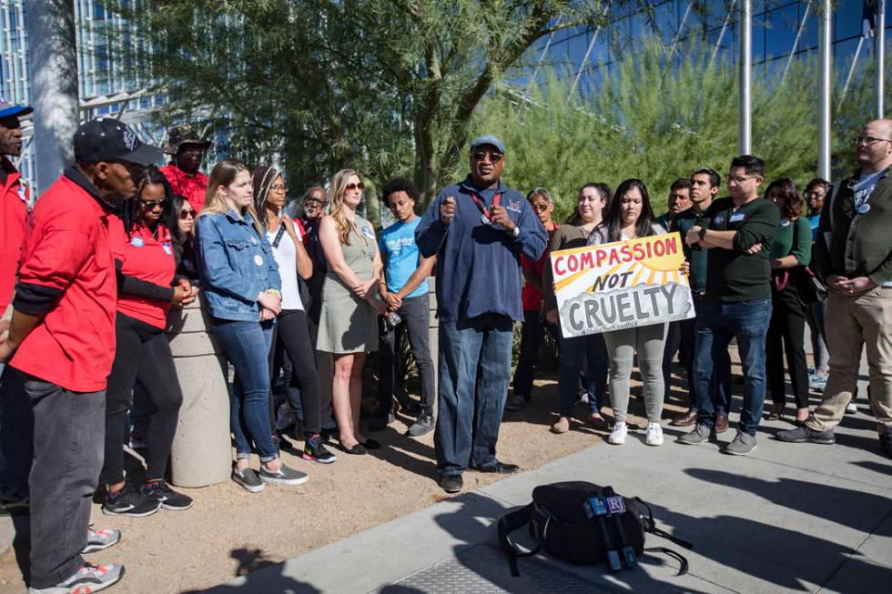 Thomas Randle-EL, co-founder and director of Straight From the Streets, addresses the media at ...