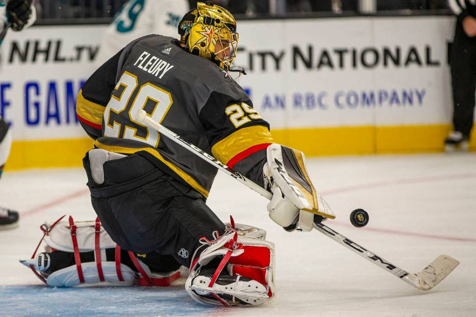 Vegas Golden Knights goaltender Marc-Andre Fleury (29) deflects a shot from the San Jose Sharks ...