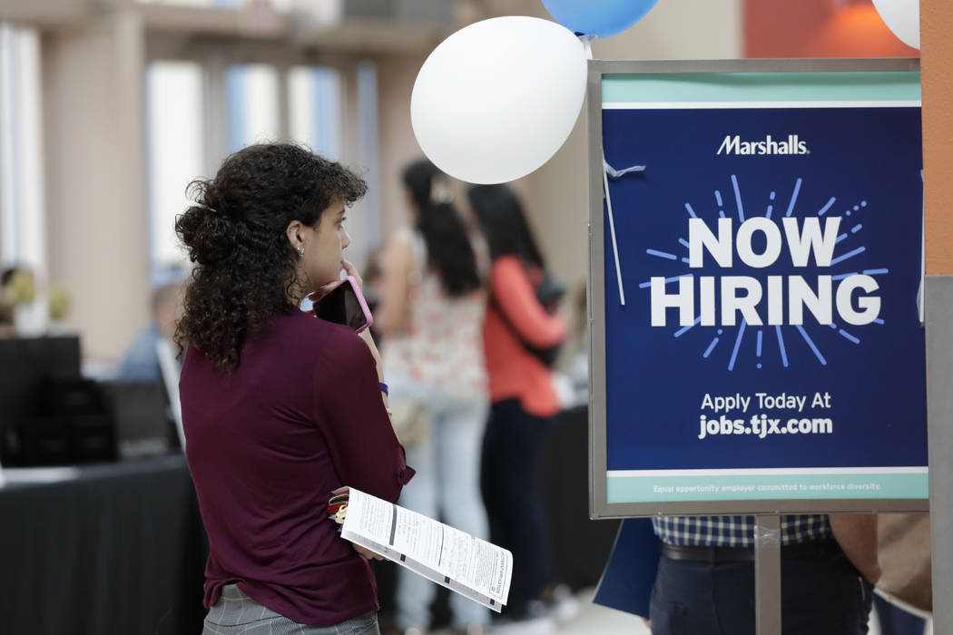 In a Tuesday, Oct. 1, 2019, photo, Daisy Ronco waits in line to apply for a job with Marshalls ...