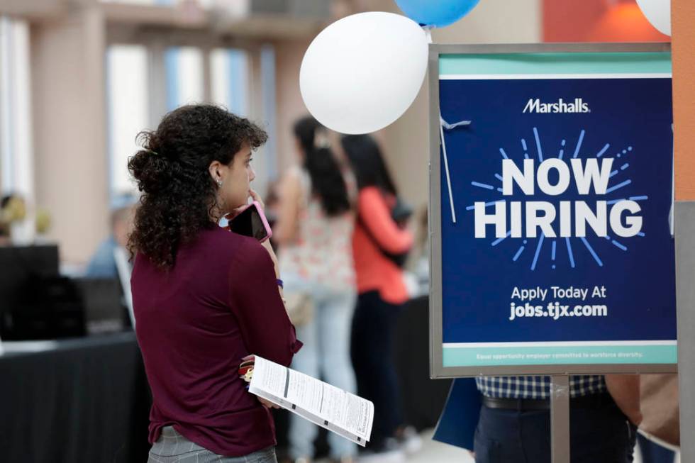 In a Tuesday, Oct. 1, 2019, photo, Daisy Ronco waits in line to apply for a job with Marshalls ...