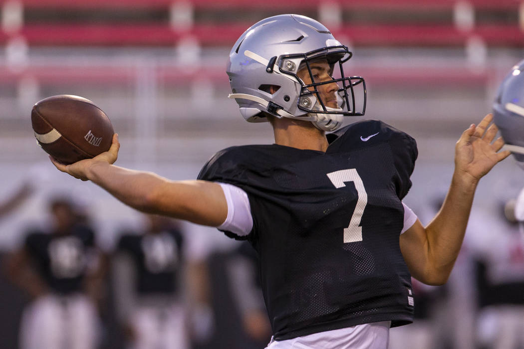 QB Kenyon Oblad (7) looks to a receiver during the UNLV football team scrimmage at Sam Boyd Sta ...