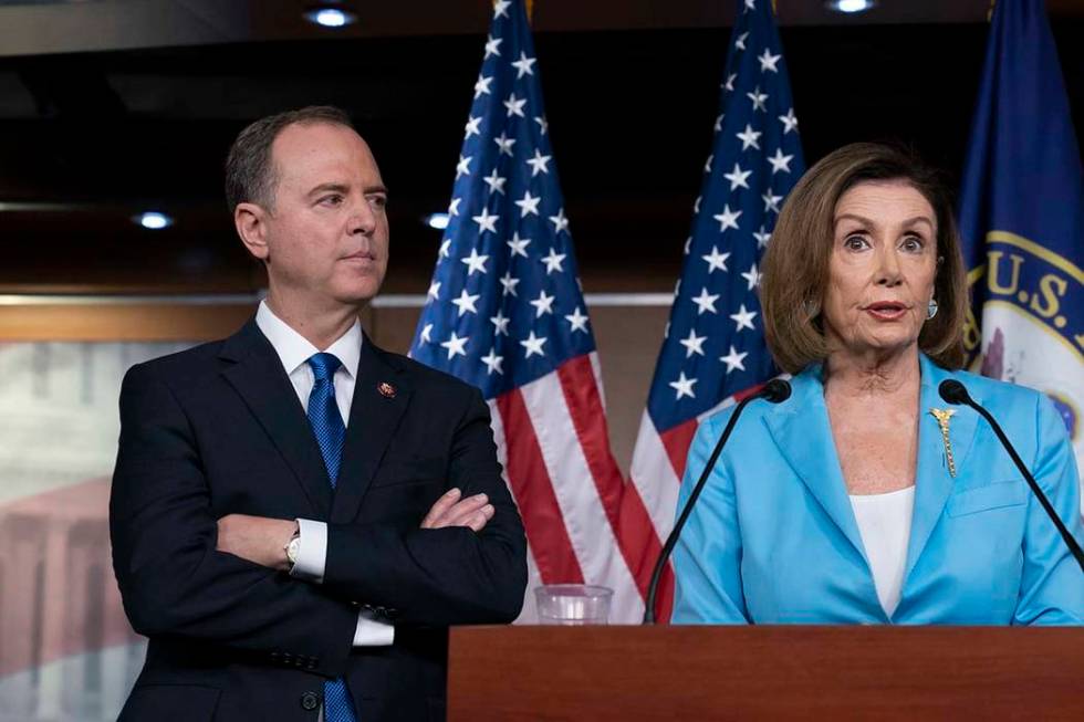 Speaker of the House Nancy Pelosi, D-Calif., is joined by House Intelligence Committee Chairman ...