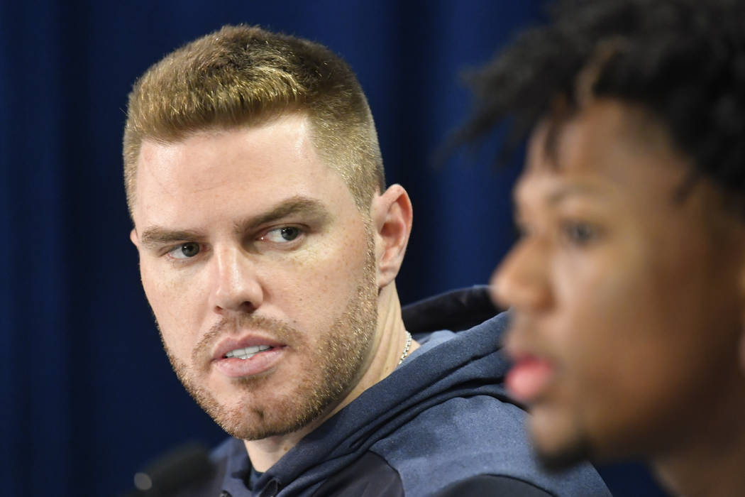 Atlanta Braves first baseman Freddie Freeman, left, and outfielder Ronald Acuna Jr. attend a ne ...