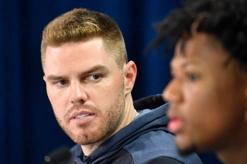 Atlanta Braves first baseman Freddie Freeman, left, and outfielder Ronald Acuna Jr. attend a ne ...