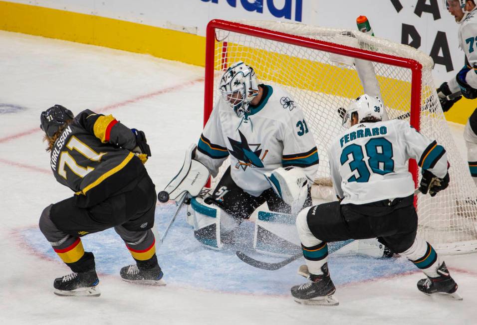 Vegas Golden Knights center William Karlsson (71) takes a shot on San Jose Sharks goaltender Ma ...