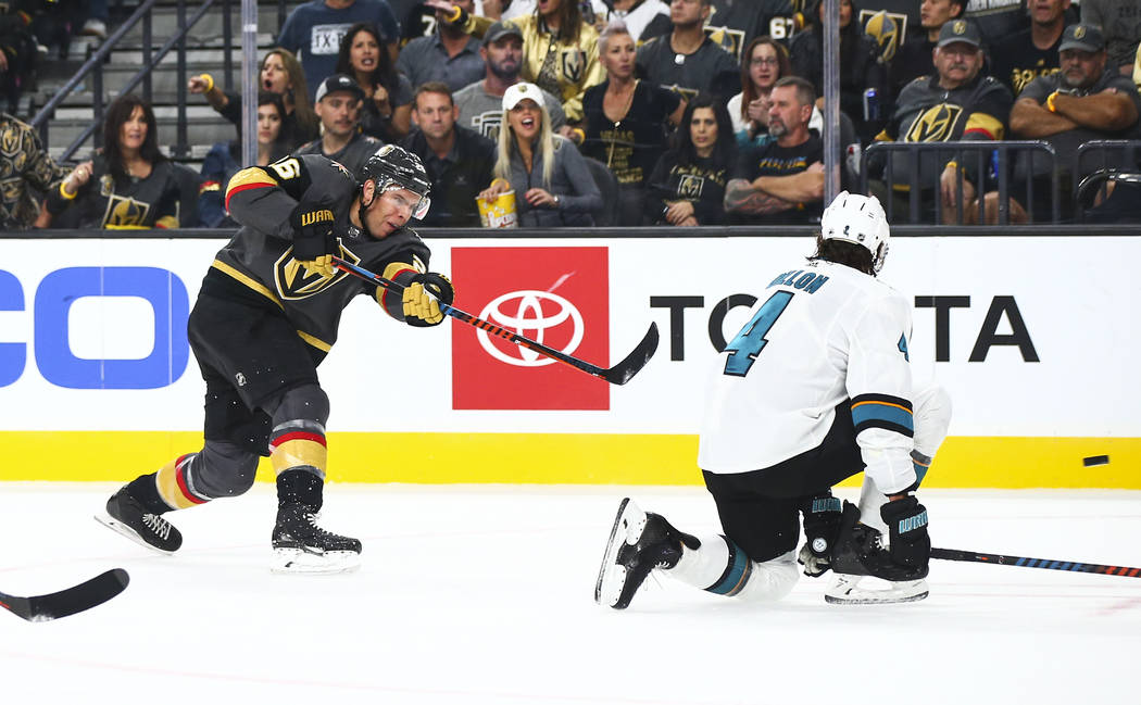 Golden Knights' Paul Stastny (26) shoots past San Jose Sharks' Brenden Dillon (4) during the fi ...