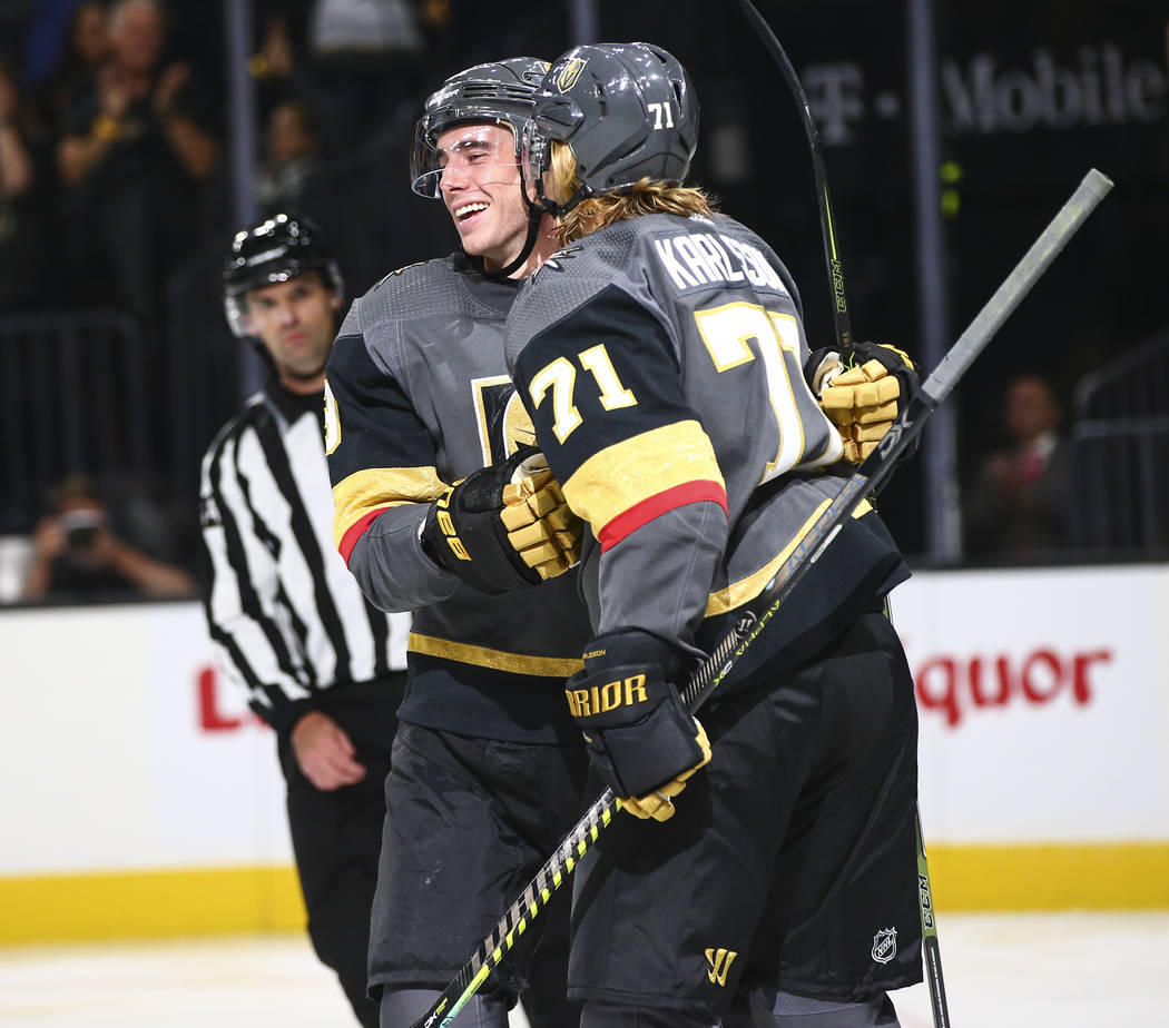 Golden Knights' Reilly Smith, left, and William Karlsson (71) celebrate a shorthanded goal agai ...
