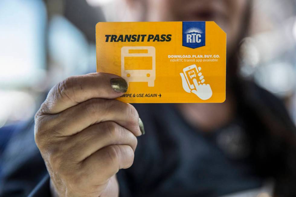 Elena Leger holds her one-day RTC bus pass while en route to Toshiba Plaza to watch the Vegas G ...