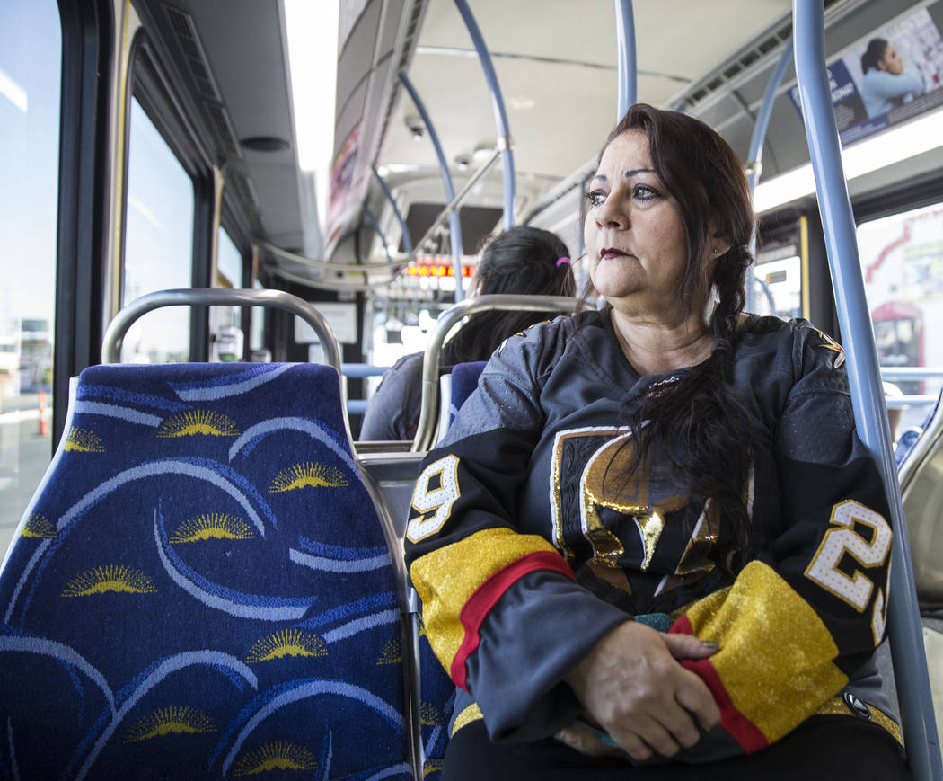 Elena Leger rides an RTC bus to Toshiba Plaza to watch the Vegas Golden Knights season opener a ...