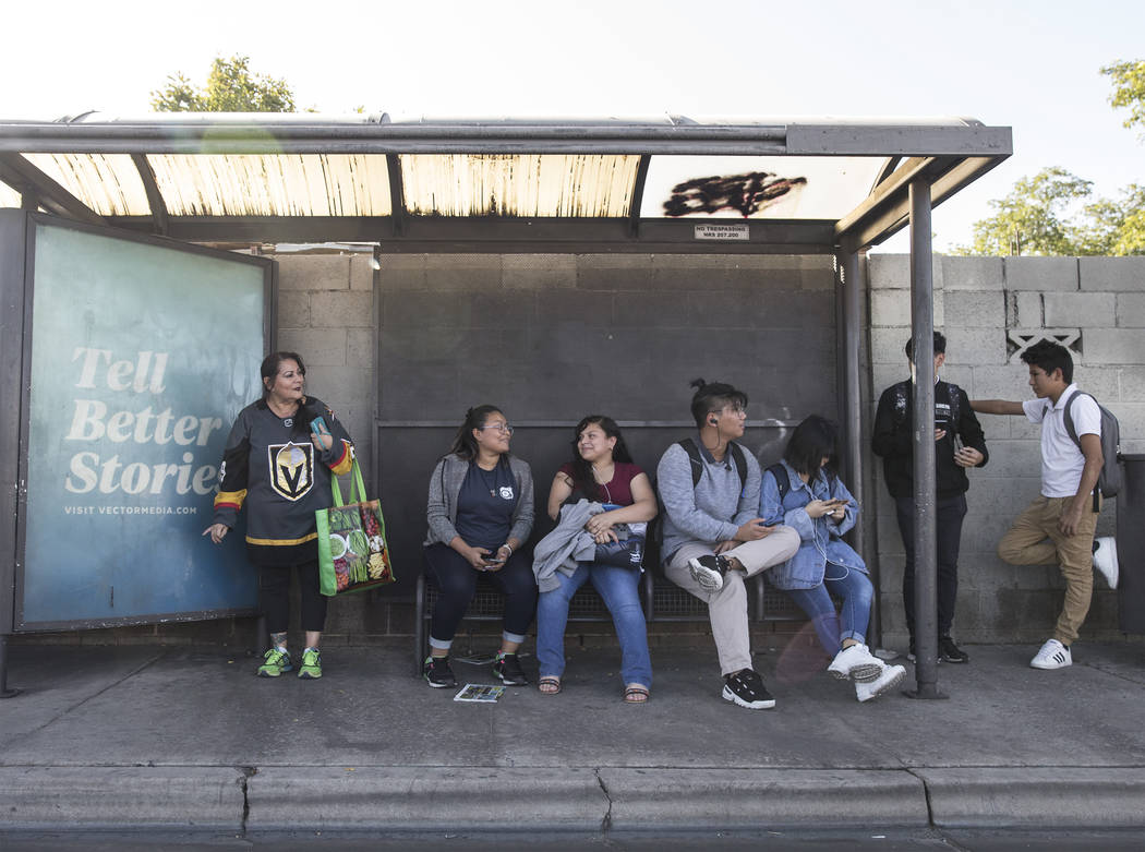 Elena Leger, left, waits for an RTC bus to take her to Toshiba Plaza to watch the Vegas Golden ...