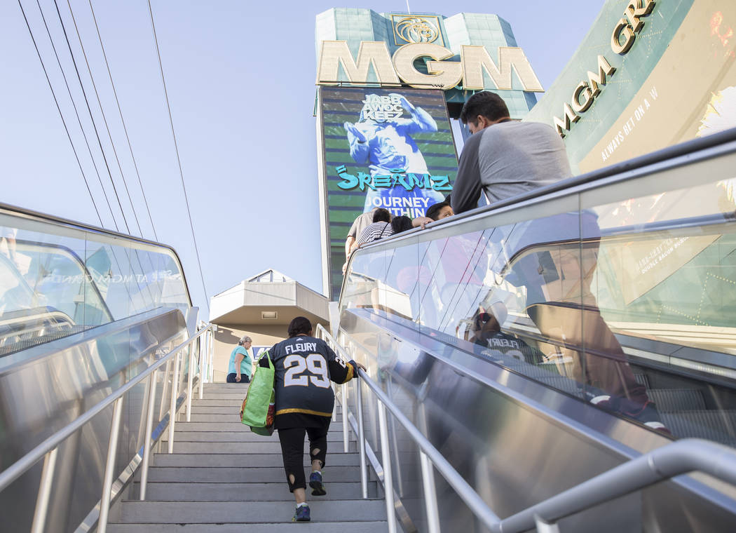 Elena Leger, left, walks towards Toshiba Plaza to watch the Vegas Golden Knights season opener ...