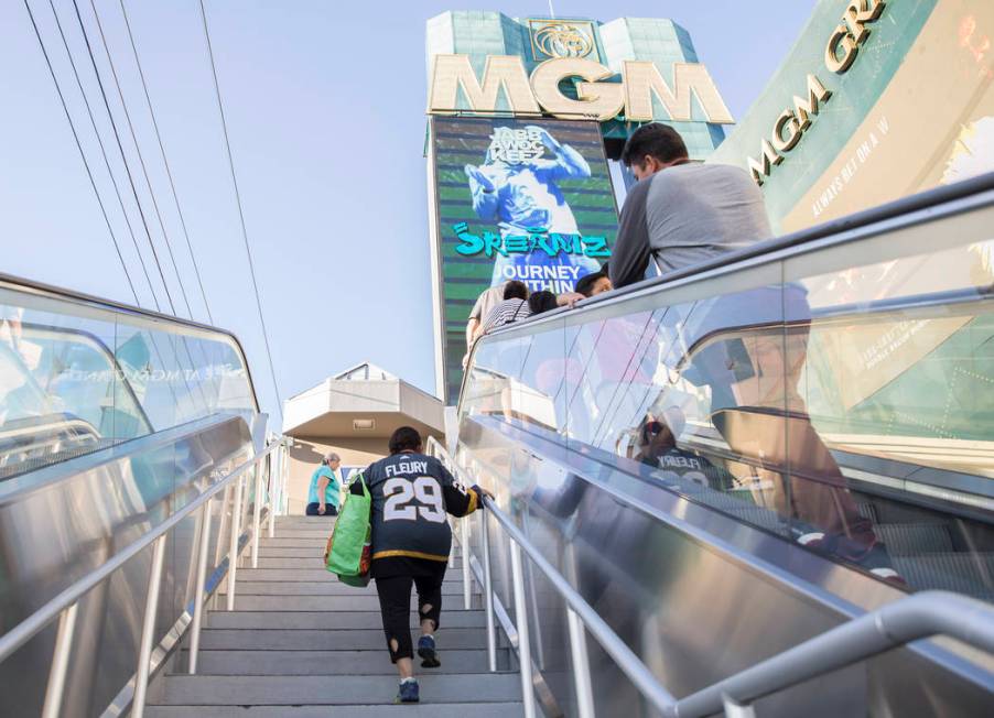 Elena Leger, left, walks towards Toshiba Plaza to watch the Vegas Golden Knights season opener ...