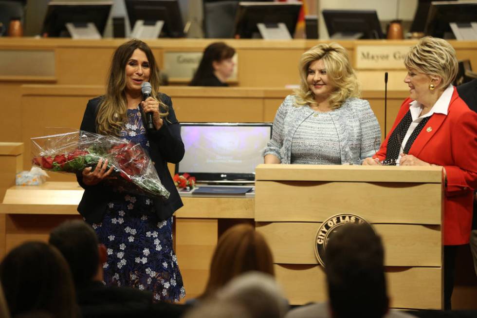 New Councilwoman Victoria Seaman, from left, gives a speech after getting sworn into office, wi ...