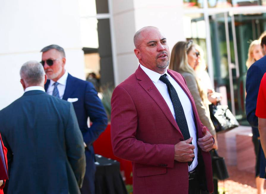 UNLV football coach Tony Sanchez looks on before the start of a ribbon cutting ceremony for the ...