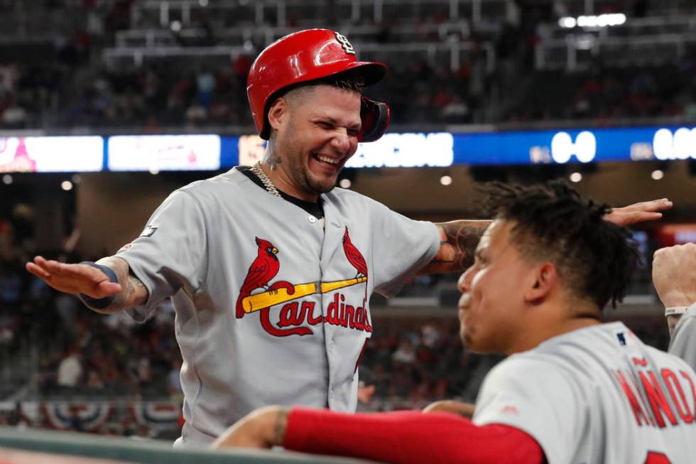 St. Louis Cardinals catcher Yadier Molina celebrates in the ninth inning during Game 1 of a bes ...