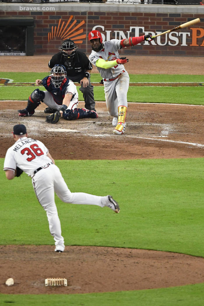 St. Louis Cardinals left fielder Marcell Ozuna (23) hits a two RBI double against the Atlanta B ...