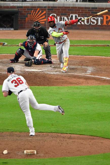 St. Louis Cardinals left fielder Marcell Ozuna (23) hits a two RBI double against the Atlanta B ...