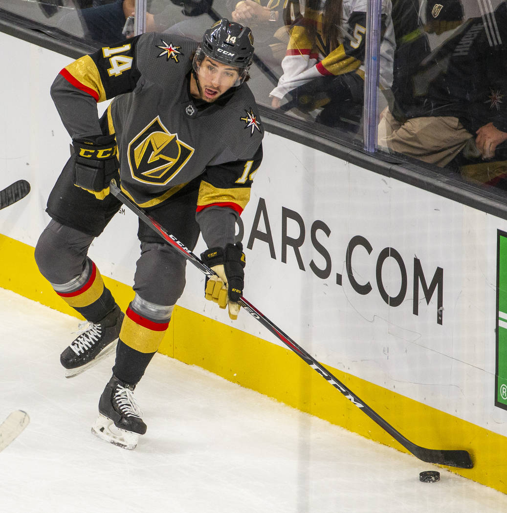 Vegas Golden Knights defenseman Nicolas Hague (14) looks to pass versus the San Jose Sharks dur ...