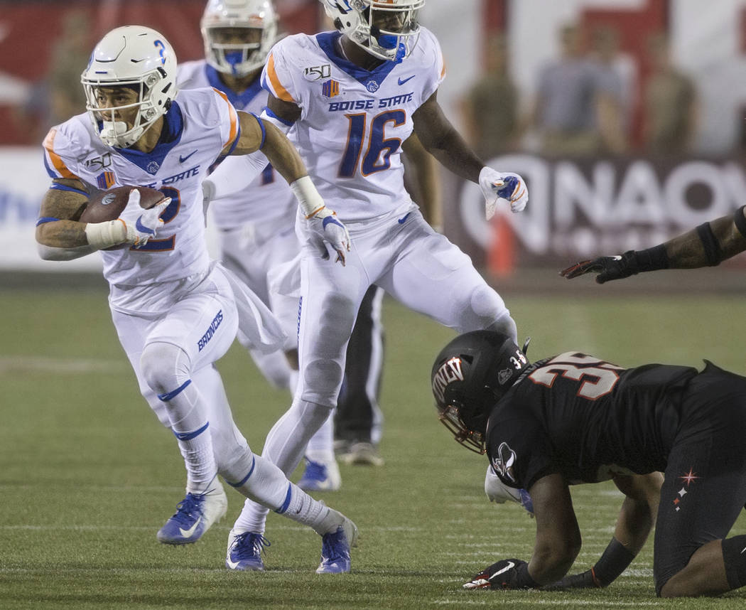 Boise State Broncos wide receiver Khalil Shakir (2) breaks free of UNLV Rebels linebacker Jacob ...